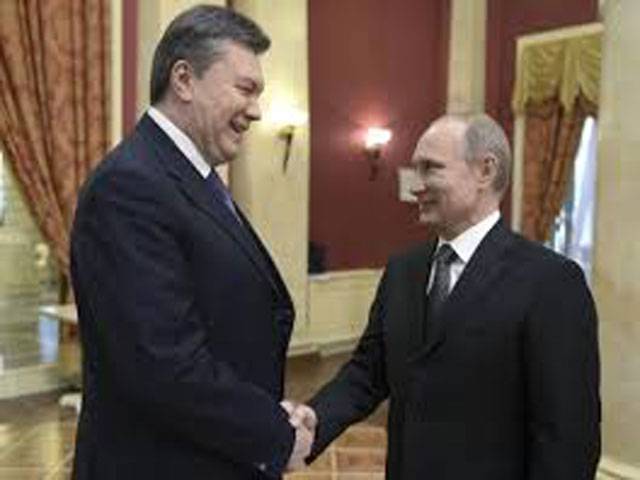 Russia presses Ukraine on gas debts as leaders meet