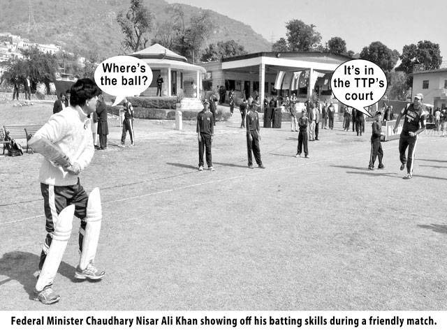 Where\'s the ball? It\'s in the TTP\'s court Federal Minister Chaudhary Nisar Ali Khan showing off his batting skills during a friendly match.