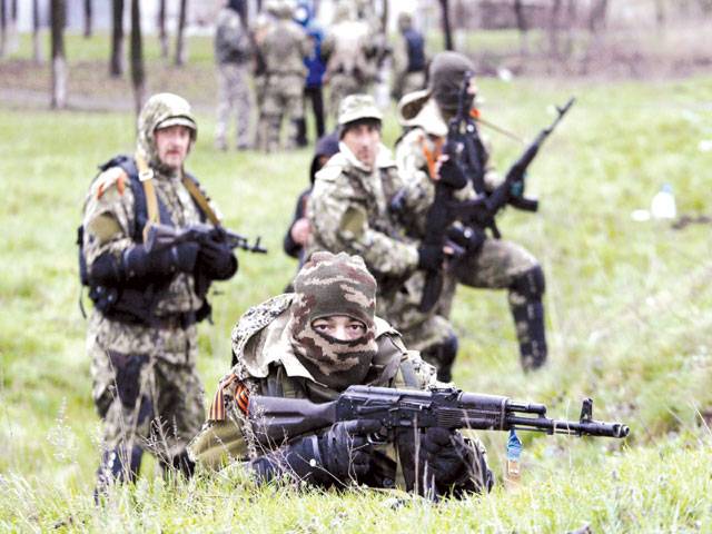 Ukraine says Russia waging ‘war’ in separatist east