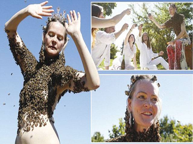 Woman with 12,000 bees on body