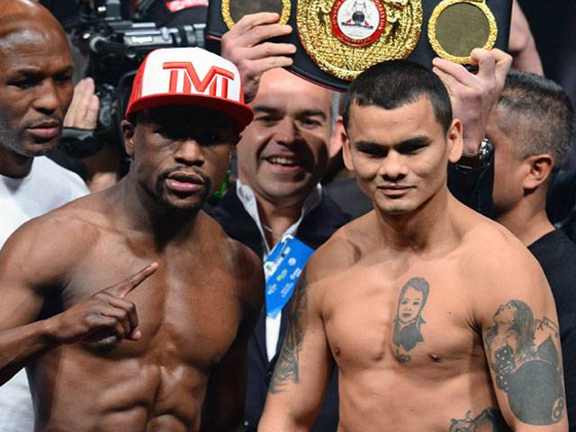Mayweather weighs in lighter than Maidana