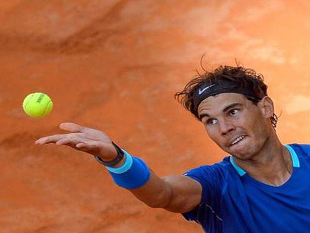 Nadal survives shaky start, sets up date with Murray