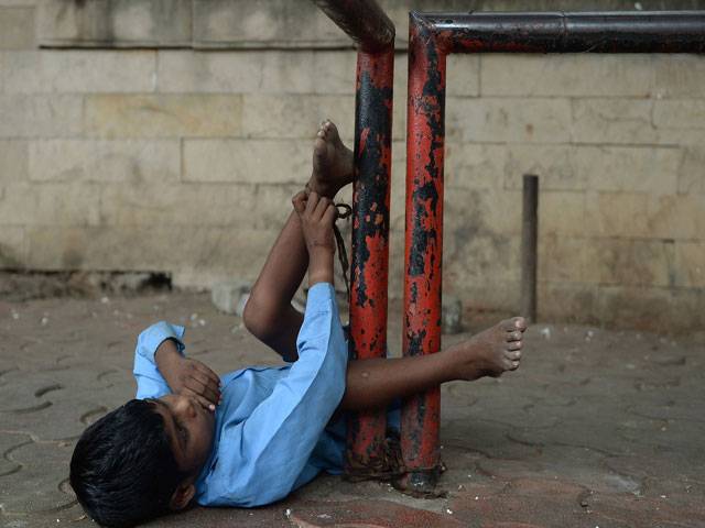 Boy tied to bus stop highlights plights of disabled Indians