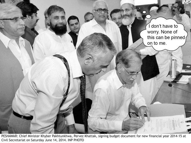  I don\'t have to worry. None of this cab be pinned on to me. Chief Minister Khyber Pakhtunkhwa, Pervez Khattak, signing budget document for new financial year 2014-15 Civil Secretariat on Saturday June 14, 2014.