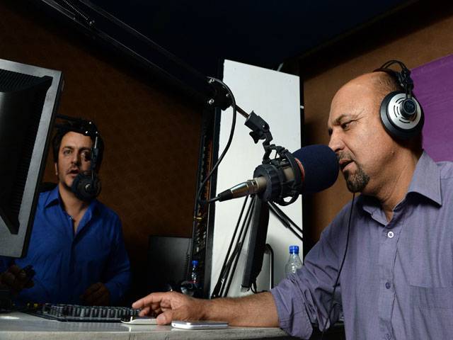 Taliban-era radio announcer rides crest of the airwaves