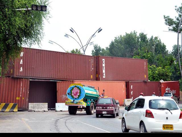 A view of the wall of containes on the road in Islamabad