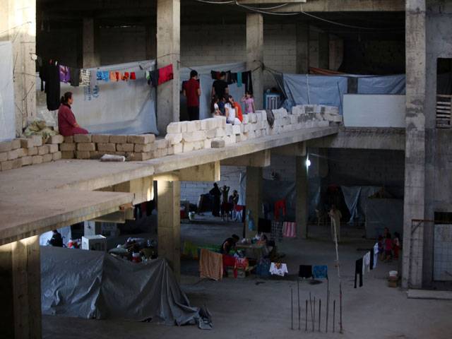Christians take shelter under construction building in Iraq