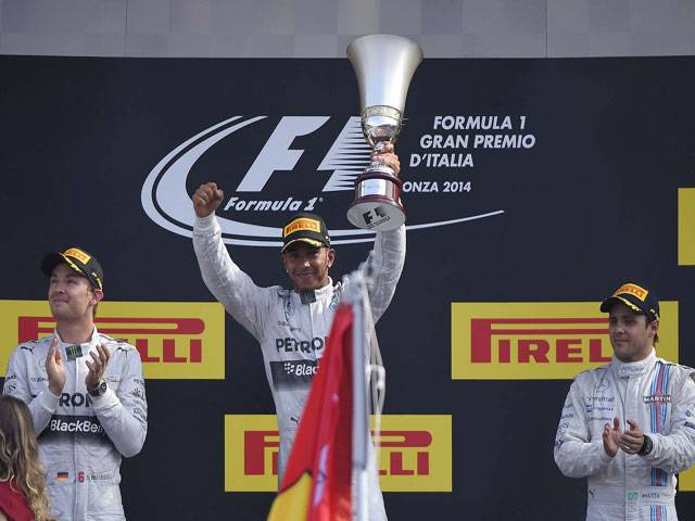 Hamilton back into title race with victory in Italy
