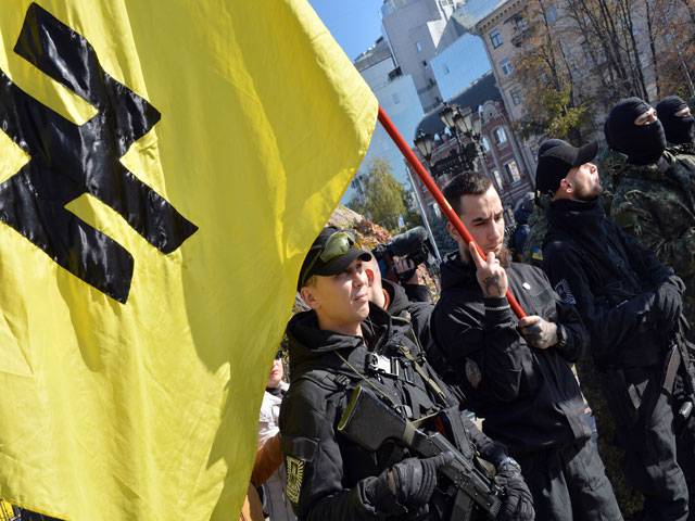 Servicemen of the pro-Ukrainian Azov battalion attend an oath-taking ceremony in Kiev