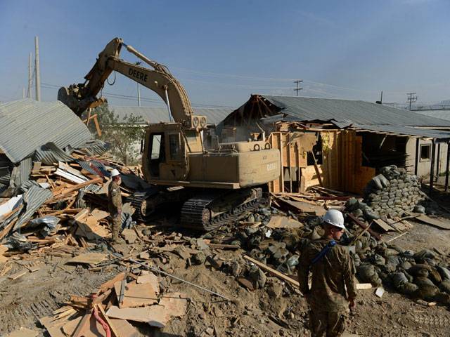 Demolition derby at huge US base as Afghan exit quickens