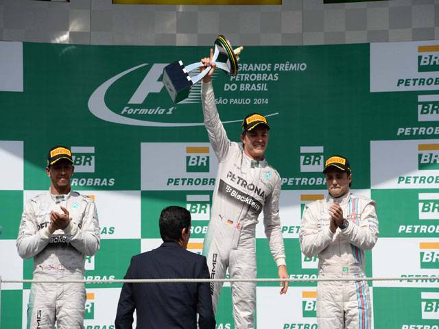 Rosberg wins in Brazil to keep title race alive