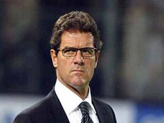 Coach Capello under fire but staying on