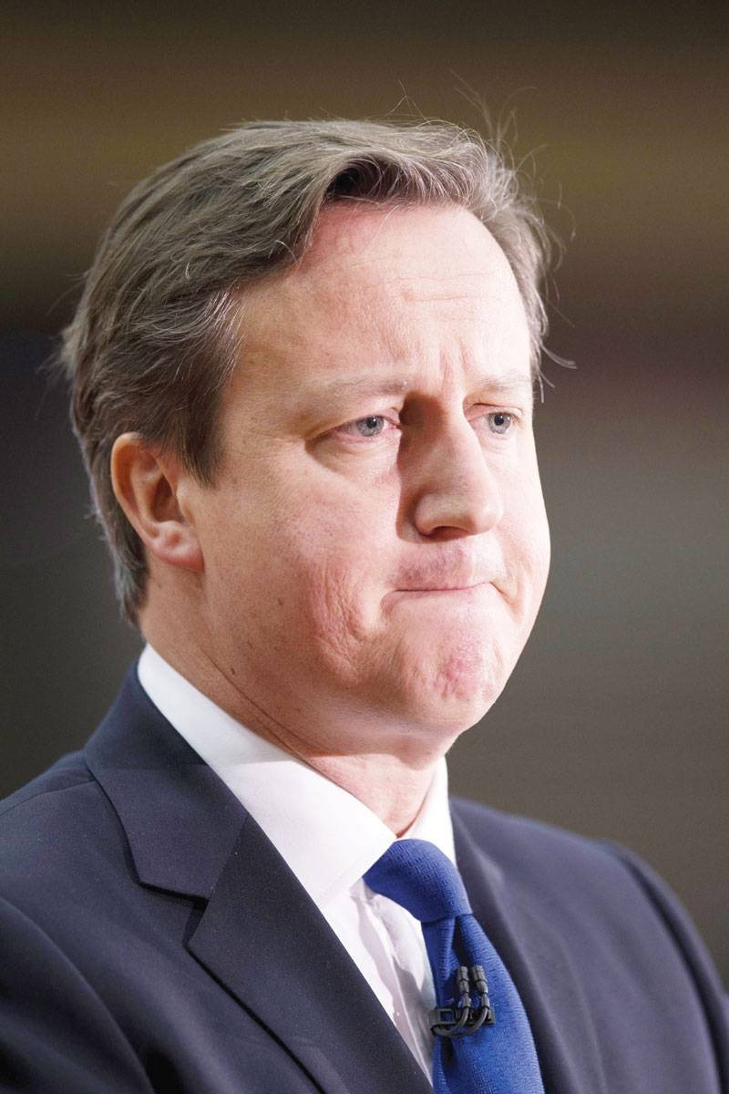 Cameron urges migrant curbs, warns on British EU exit