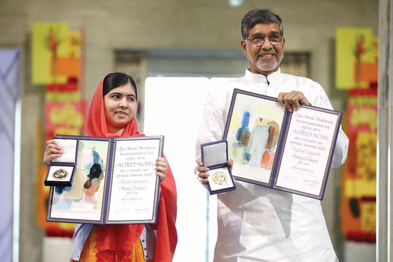 At Nobel moment, Malala vows to fight on