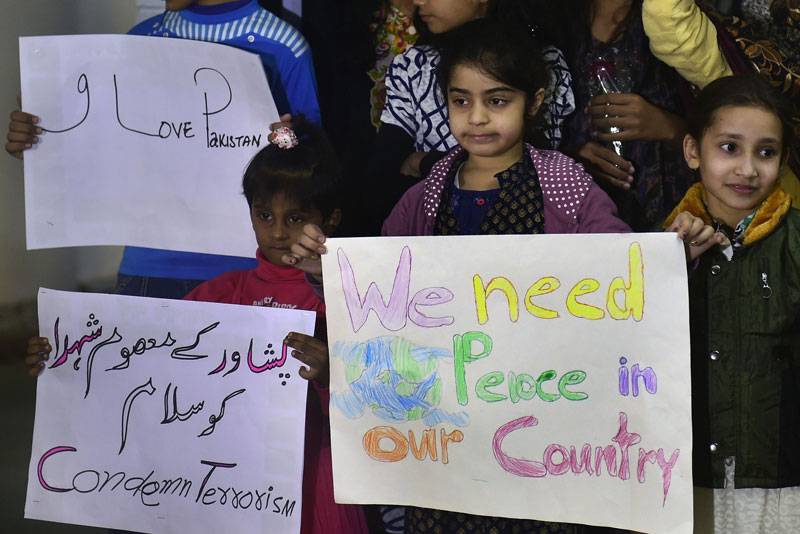 Expatriate Pakistanis living in Bangladesh participate in a vigil in Dhaka Bangladesh