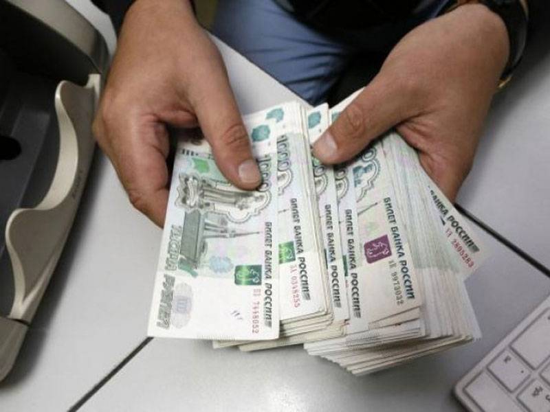 Russia says currency crisis over but inflation set to soar