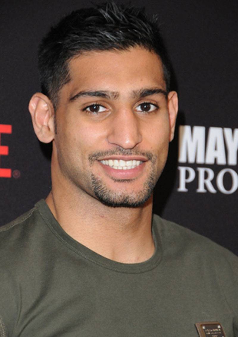 Amir Khan eyes clash with old friend Pacquiao