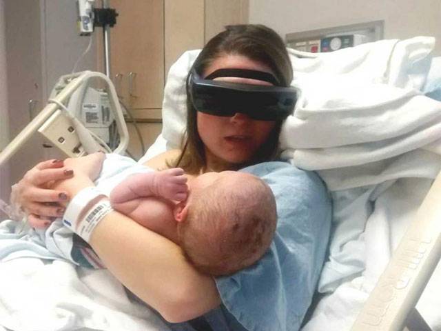 Blind mother sees baby for first time