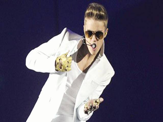 Bieber says dropping arrogant attitude