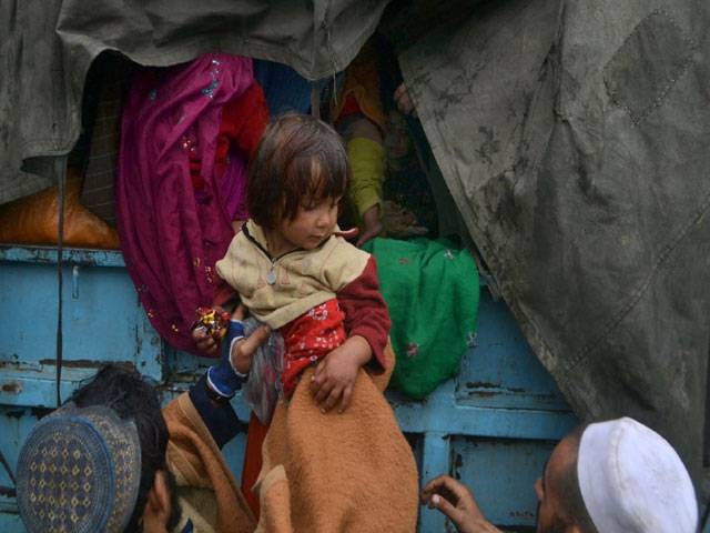 Afghan refugees return