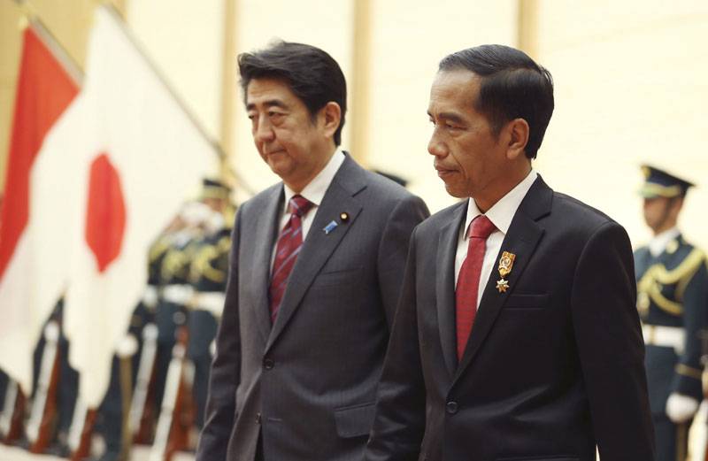 Abe, Indonesia’s Widodo to tighten defense ties
