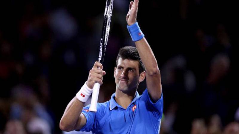 Djokovic survives scare, Serena cruises
