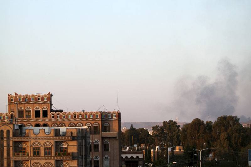 Smoke billows near military barracks in the Jabal al-Jumaima mountain in Yemen