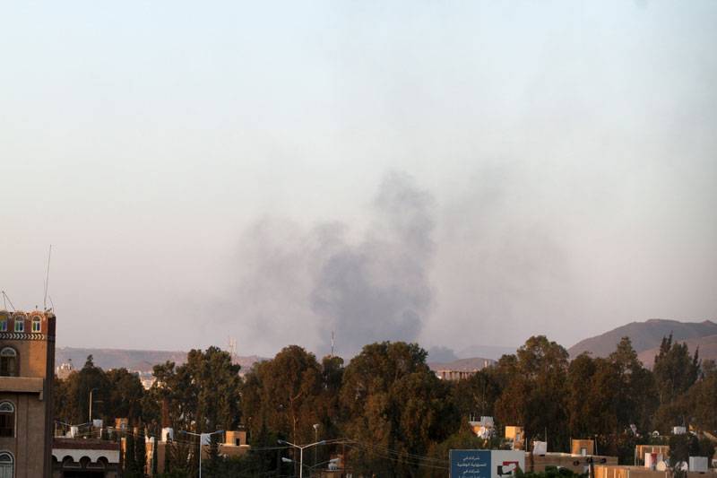 Smoke billows near military barracks in the Jabal al-Jumaima mountain in Yemen