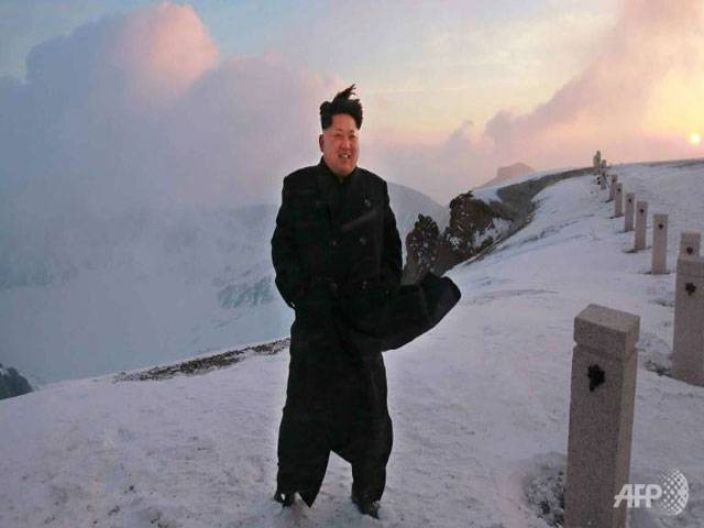 Kim climbs N Korea’s highest mountain
