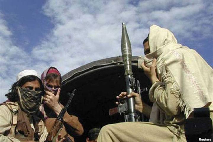 Multiple Taliban raids kill 26 Afghan police, troops