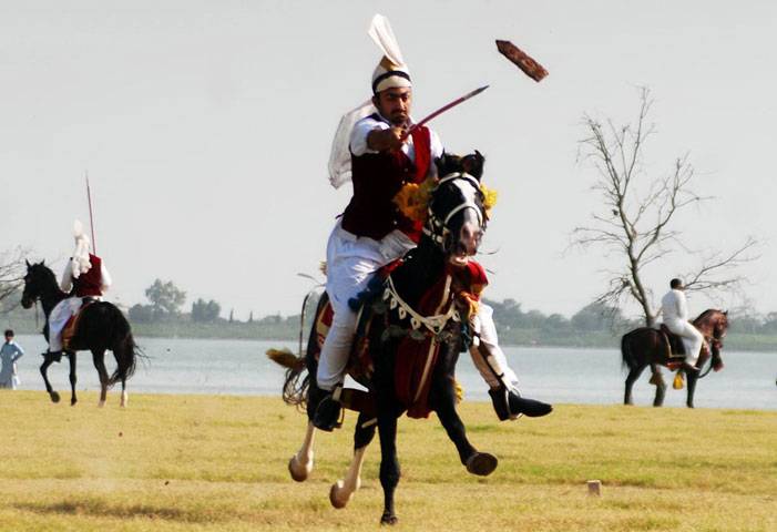 Tent pegging competition