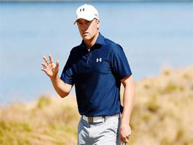 Spieth, Reed share Open lead, Woods misses cut