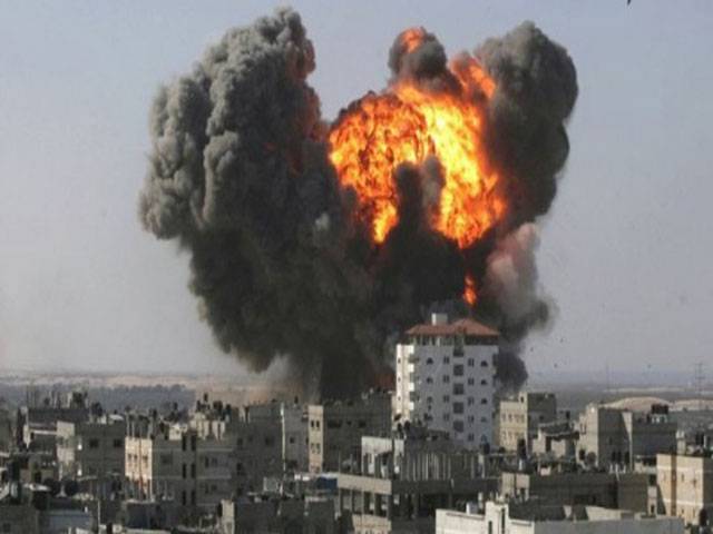 Barrel bombs kill 11 civilians in IS town in Syria