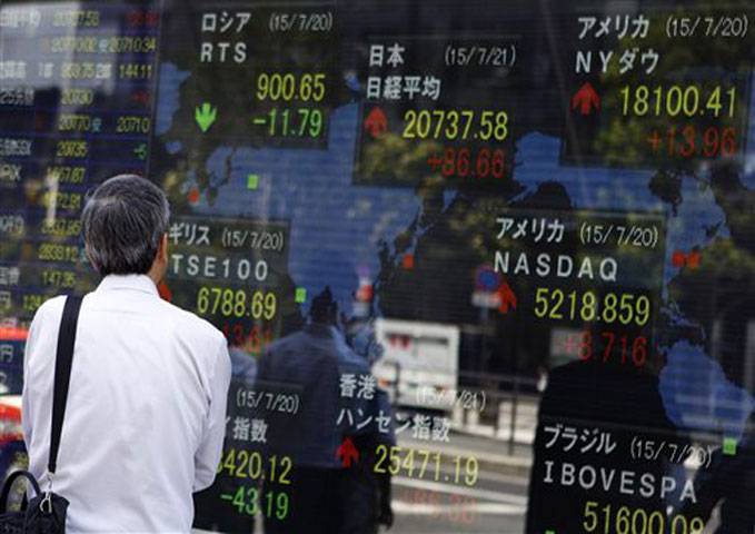 Asian shares rise but commodities struggle