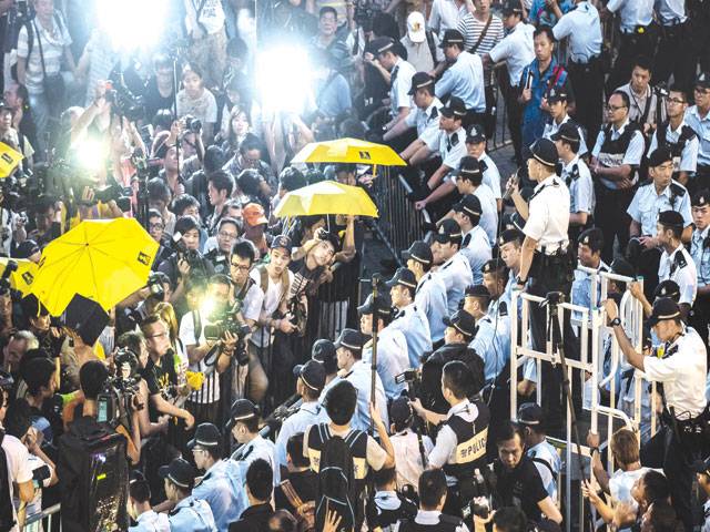 Tensions flare in HK, a year since mass rallies