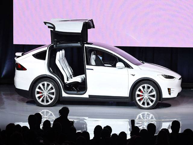 Tesla unveils Model X SUV