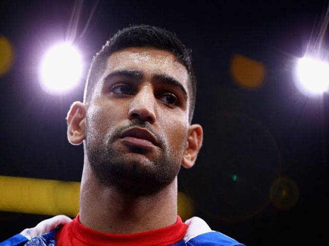 Amir Khan expects fight with Pacquiao in February