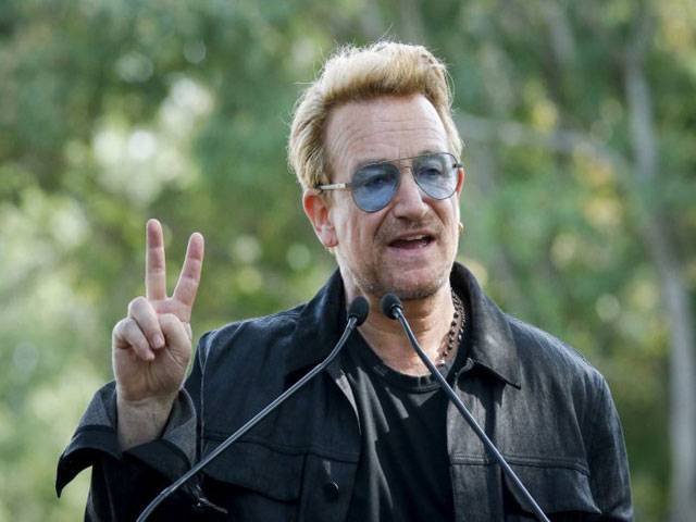 Bono urges businessmen to fight poverty