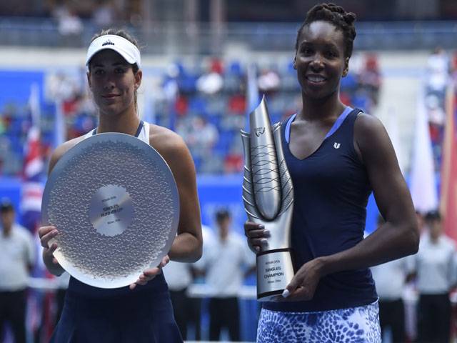 Venus wins 47th career title on Muguruza retirement