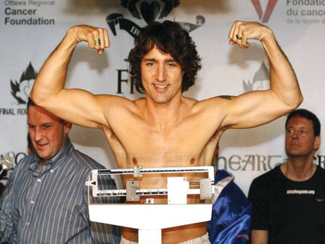Photos of muscle-flexing new Canadian PM eclipse policy talk