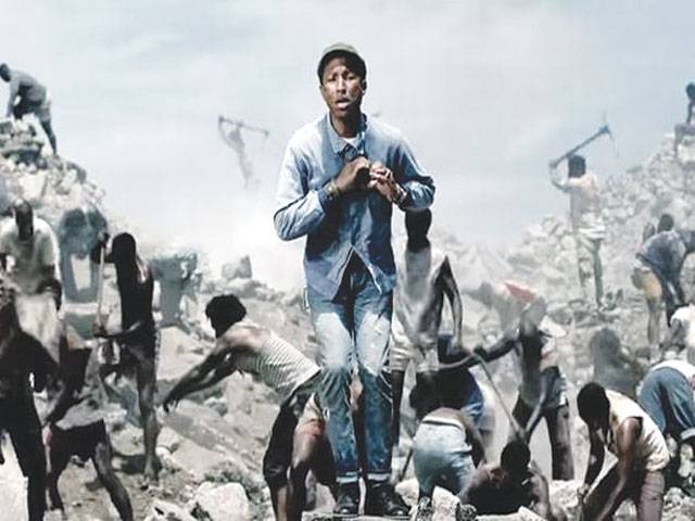 After ‘Happy,’ Pharrell dedicates ‘Freedom’ to migrants 
