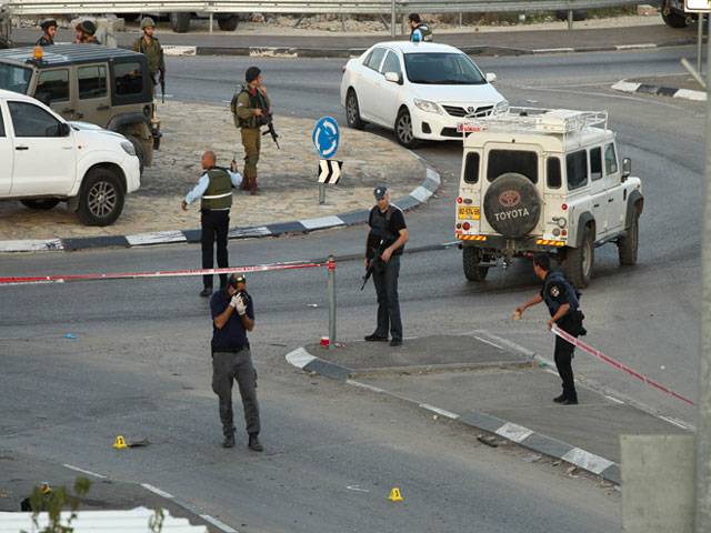 Israeli security forces gather at the site of car ramming attack West Bank City
