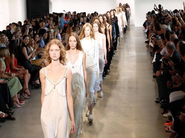 Fashion titans clash over shake-up of catwalk calendar