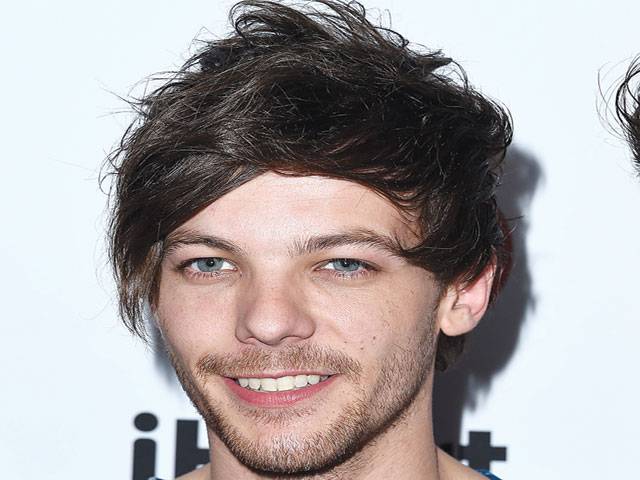 1D’s Tomlinson becomes father