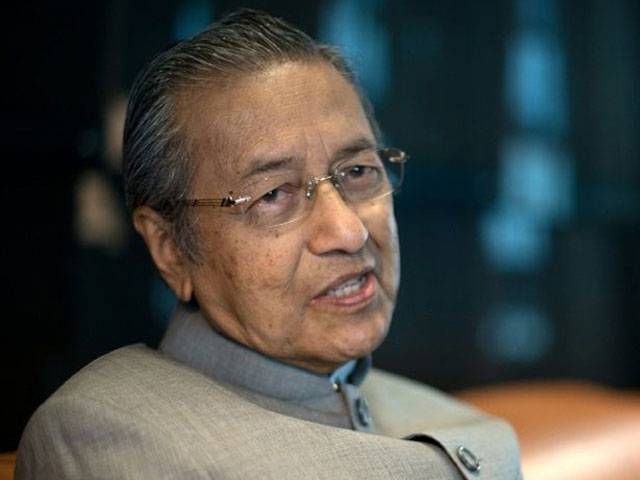 Malaysia's Mahathir quits ruling party over PM scandals