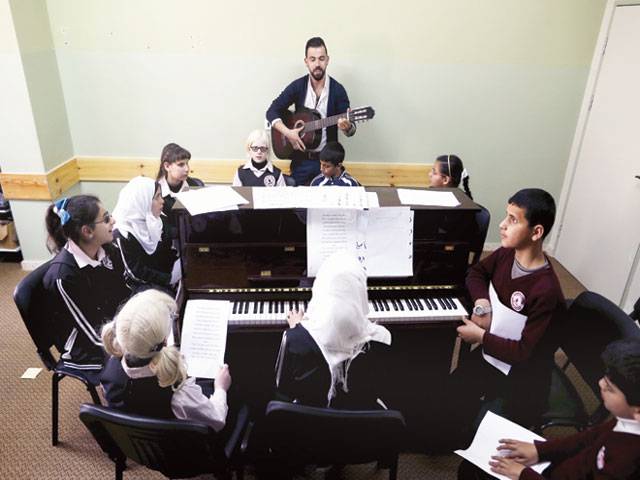 Palestinians teach blind students English via music 