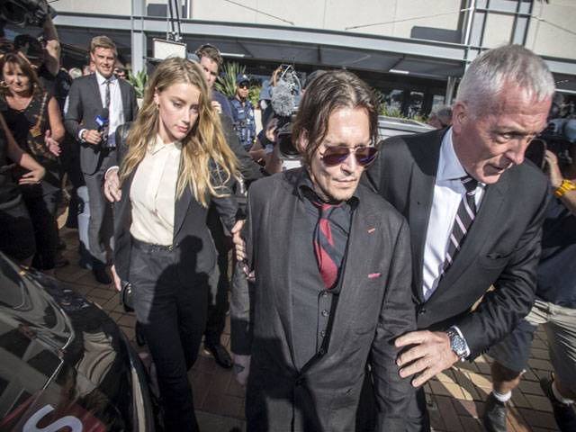 Depp, Amber in apology for Aussie dog case