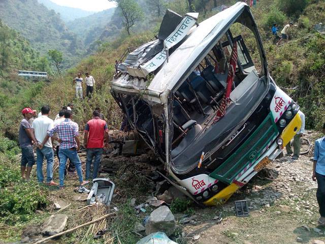 India bus crash kills 14 after road collapse