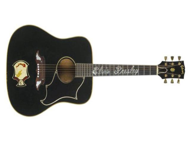 Elvis guitar fetches $334,000 at auction