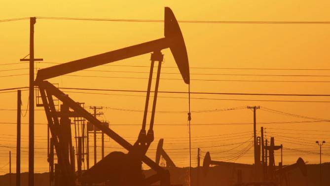 Oil prices fall back after breaching $50